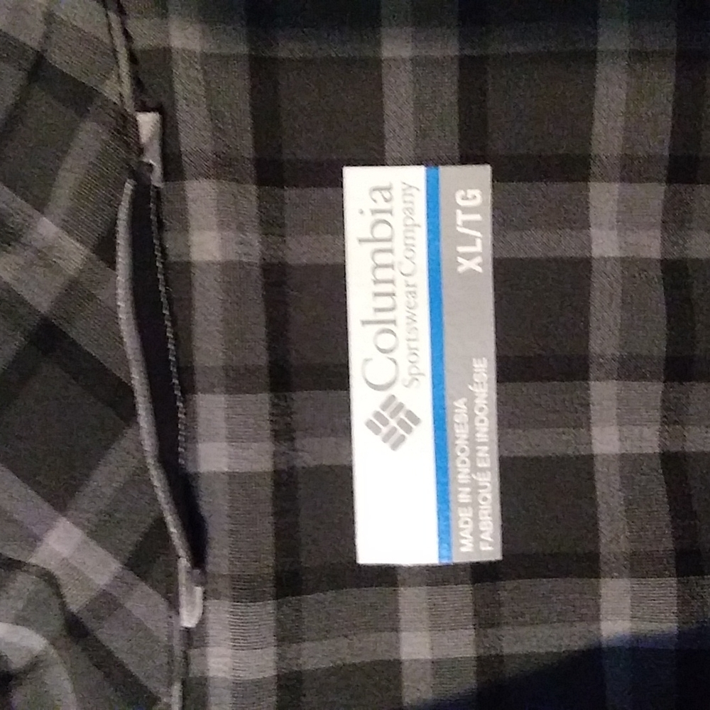 This shirts is a long sleeve, button down Columbia shirt.